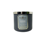 Bath & Body Works White Barn Mahogany Teakwood candle close-up highlighting woodsy notes for a cozy space.