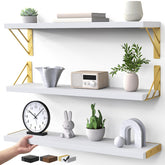 BAYKA wall shelves with white and gold finish, 23-inch triple set, ideal for display and storage.