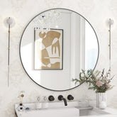BEAUTYPEAK 24-inch round mirror with black frame for entryway decor.