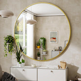BEAUTYPEAK 24in round gold mirror with a sleek frame boosts entryway ambiance.