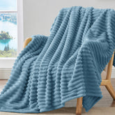 BEDELITE blue throw front view highlights warm sofa comfort