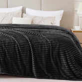 BEDELITE king-size fleece blanket with 3D ribbed jacquard adds warmth and style.