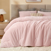 Bedelite fleece queen comforter outer view in pink with plush warmth