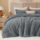 BEDELITE fleece queen comforter set on bed, plush and inviting warmth.