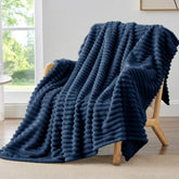 BEDELITE fleece throw blanket navy on couch for cozy warmth