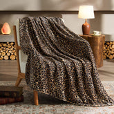 BEDELITE leopard blanket closeup fabric shows soft fleece texture for lounging
