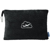 BEDELITE travel blanket folded neatly in its storage bag for compact packing.
