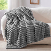 BEDELITE twin blanket striped gray folded showcases decorative warmth.