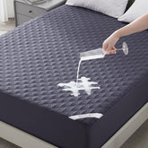 BEDLORE waterproof mattress protector with full-depth fit guards against spills and stains