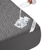 BEDLORE waterproof mattress protector top view with quilted gray surface showing spill protection