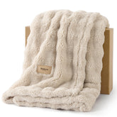 Bedsure 3D fleece bubble texture closeup for cozy sofa lounging.