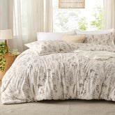 Bedsure beige floral reversible comforter set on a bed for versatile decor