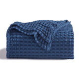 Bedsure cooling cotton waffle blanket close-up shows texture and breathable comfort.