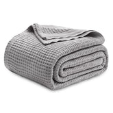 Bedsure Gentlesoft cotton blanket on bed delivers breathable, cool comfort all night.