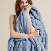 Bedsure GentleSoft Ashley Blue Throw close-up showcases ultra-soft fleece for cozy evenings.