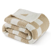 Bedsure GentleSoft checkered twin blanket on sofa for cozy lounging