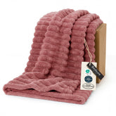 Bedsure GentleSoft Dusty Pink Throw on couch for cozy lounging
