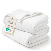 Bedsure GentleSoft fleece blanket full-size white in a cozy bedroom for warmth