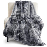 Bedsure GentleSoft fluffy faux fur throw on couch offering plush comfort and warmth