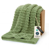 Bedsure GentleSoft Green Throw on couch closeup shows plush fleece and comfort.