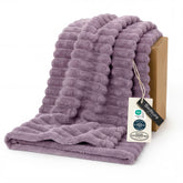 Bedsure GentleSoft light purple throw on couch adds cozy warmth.
