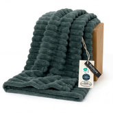 Bedsure GentleSoft Mallard Green fleece blanket on couch delivering plush comfort for movie nights