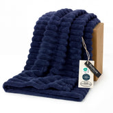 Bedsure GentleSoft navy blanket closeup texture for cozy lounging.
