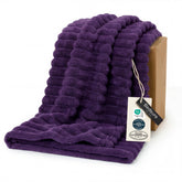 Bedsure GentleSoft purple fleece blanket on couch for cozy lounging