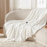 Bedsure heated blanket throw with striped white flannel for cozy evenings.
