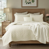 Bedsure king quilt with cream embossed clover pattern adds a cozy focal point to your bed.