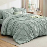 Bedsure oversized king comforter in sage green with pintuck detail for a plush look.