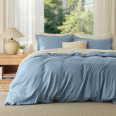 Bedsure queen duvet cover in mineral blue on bed shows soft, breathable microfiber.