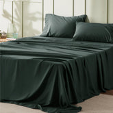 Bedsure queen sheet set in forest green on bed showing plush comfort.