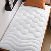 Bedsure twin mattress pad with soft brushed cover for quiet nights.