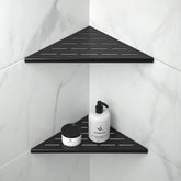 Bernkot Corner Shelf 10-inch matte black with slot design for shower storage.