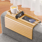 Bestjing bamboo sofa armrest tray on a couch provides a natural surface for drinks and remotes.