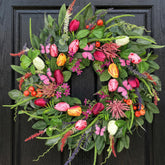 BHHDA front door wreath with tulips and butterflies for curb appeal