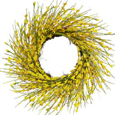 Bibelot 20-inch artificial forsythia wreath on front door enhances curb appeal.