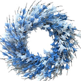Bibelot 22-inch blue Forsythia wreath on front door adds vibrant curb appeal.