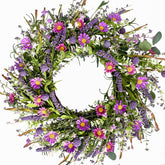 Bibelot 22-inch purple flower wreath on front door enhances curb appeal with vivid blooms.