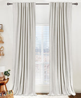 100% Blackout Shield close-up of beige linen-curtain fabric showing soft texture and light reduction.