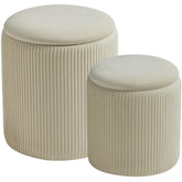 BLEXA round ottomans with storage in velvet, a versatile seating and organization solution.