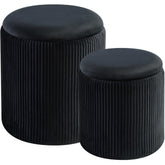BLEXA round storage ottoman in black velvet with concealed space for essentials.