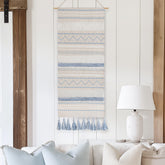 BlissBlush coastal blue tapestry vertical hanging adds boho charm to a living room.