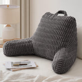 Blissful Diary reading pillow backrest with arms provides sturdy support for lounging.