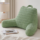 Blissful Diary reading pillow with sage-green cover supports posture during reading.