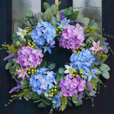 Bloeien front door wreath with blue and purple hydrangea for seasonal curb appeal