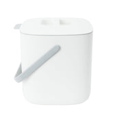 Blue Ginkgo kitchen compost bin lid with tight seal contains odors.