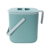 Blue Ginkgo kitchen compost bin lid seals tightly to keep odors contained on the counter.