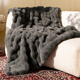blunique ultra-soft fur throw blanket front view enhances couch coziness
